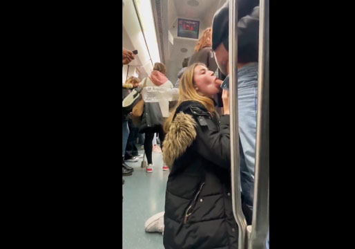 Blonde gives a blowjob in the subway among people